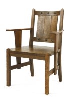 Lot 85 - An Arts & Crafts oak armchair