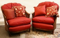 Lot 479 - A pair of early 20th century rosewood bergere tub chairs