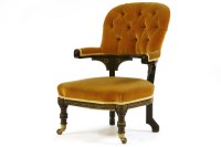 Lot 528 - A Victorian aesthetic movement ebonised and parcel gilt open armchair