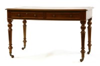 Lot 399 - A Victorian mahogany writing table