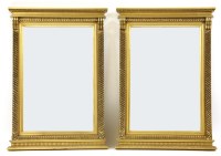 Lot 529 - A pair of conical design gilt wall mirrors