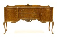 Lot 545 - An Epstein burr walnut Queen Anne style serpentine front sideboard