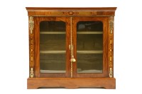 Lot 516 - A Victorian inlaid two door pier cabinet