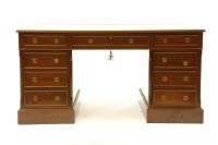 Lot 456 - A 20th Century mahogany pedestal desk