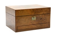 Lot 284 - A Victorian walnut dressing case
