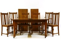 Lot 410 - An oak dining table