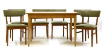Lot 411 - A Gordon Russell retailed by Heals walnut and beechwood dining suite