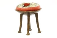 Lot 449 - A dish topped tribal stool