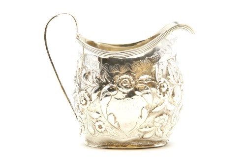 Lot 94 - A Georgian silver cream jug