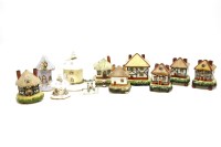 Lot 125 - A group of Staffordshire cottage figures