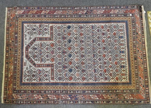 Lot 397 - A cream ground prayer rug