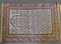 Lot 397A - A cream ground prayer rug