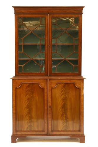 Lot 443 - A Georgian mahogany bookcase cabinet