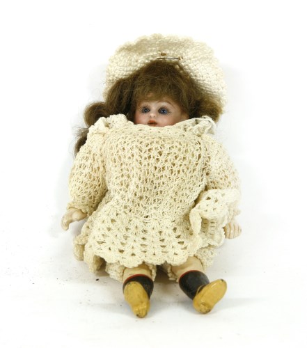Lot 76 - A Victorian doll of miniature proportions