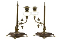 Lot 537 - A pair of brass student oil lamps