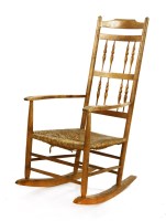 Lot 158 - An ash spindle-back rocking chair