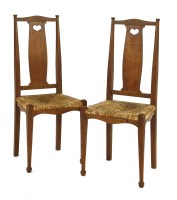Lot 49 - A pair of ‘Fine Feathers’ oak bedroom chairs