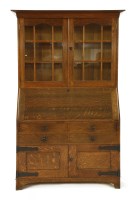 Lot 48 - An oak bureau bookcase