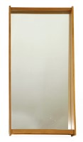 Lot 669 - A teak wall mirror