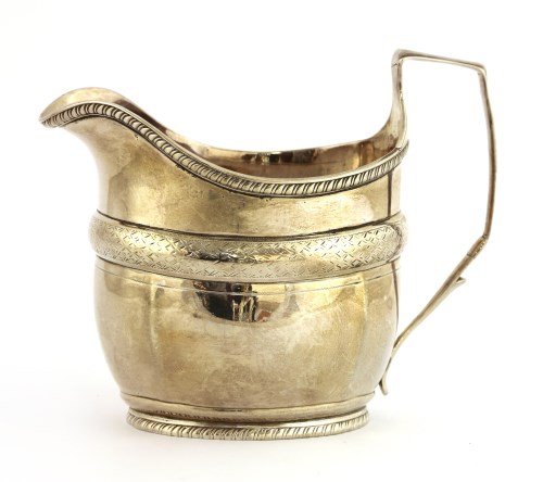 Lot 49 - A George III silver cream jug