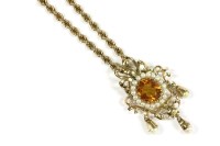 Lot 168 - A gold single stone citrine and cultured pearl brooch/pendant