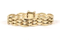 Lot 189 - A 9ct gold three row raised chevron shaped link bracelet