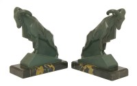 Lot 262 - A pair of patinated spelter bookends