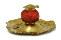 Lot 100 - A Kralik cranberry and brass-mounted inkwell