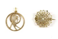 Lot 123 - A gold circular open Madonna pendant