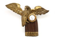 Lot 472 - An Empire carved wood end gilt wall clock