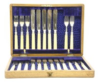 Lot 410 - A part cased set of silver and ivory handled fish knives and forks