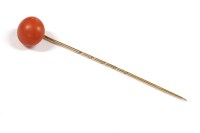 Lot 218 - A Victorian 9ct gold coral bouton stick pin
