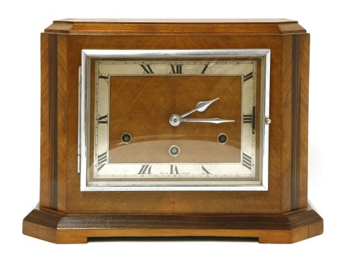 Lot 181 - An Art Deco walnut and coromandel inlaid mantel clock