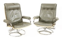 Lot 465 - A pair of grey leather loungers