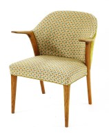 Lot 425 - A Danish oak upholstered elbow chair