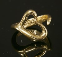 Lot 214 - A gold open curved heart ring by Tiffany