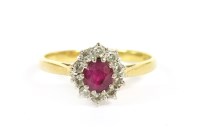 Lot 195 - An 18ct gold ruby and diamond cluster ring