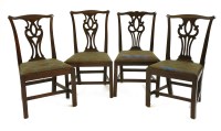 Lot 379 - A set of four George III mahogany dining chairs