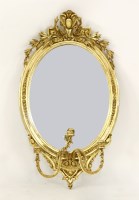 Lot 402 - A Neoclassical design gilt wall mirror
