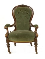 Lot 556 - A Victorian carved mahogany gentleman's armchair