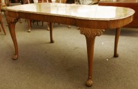Lot 331 - An Epstein Queen Anne style burr walnut dining table