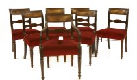 Lot 424 - A set of six and one Regency mahogany bar back dining chairs