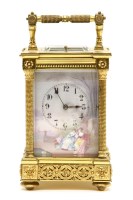 Lot 428 - A French brass and porcelain panel carriage clock