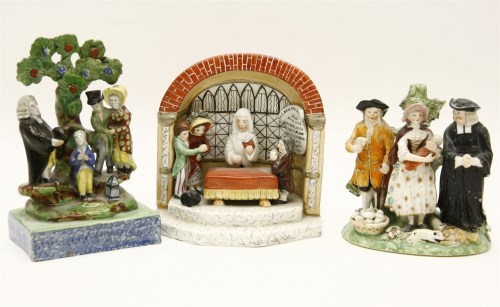 Lot 656 - A group of three Staffordshire 'Marriage Act' figures