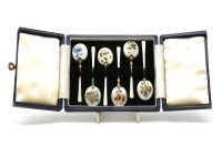 Lot 343 - Six silver gilt and enamel coffee spoons