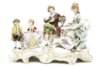 Lot 686 - A large Continental porcelain group depicting a family