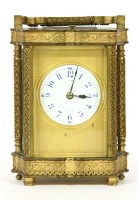 Lot 441 - A late 19th century to early 20th century brass carriage clock