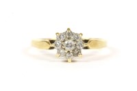 Lot 3 - An 18ct gold diamond daisy cluster ring