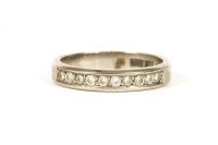 Lot 24 - A Swedish white gold diamond half eternity ring