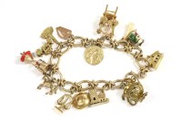 Lot 224 - A 9ct gold oval and kiss link charm bracelet